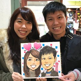 若い世代からも大好評の男性似顔絵師が描いたカップルの似顔絵