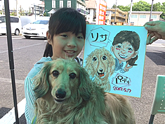 似顔絵をお描きした女の子と愛犬